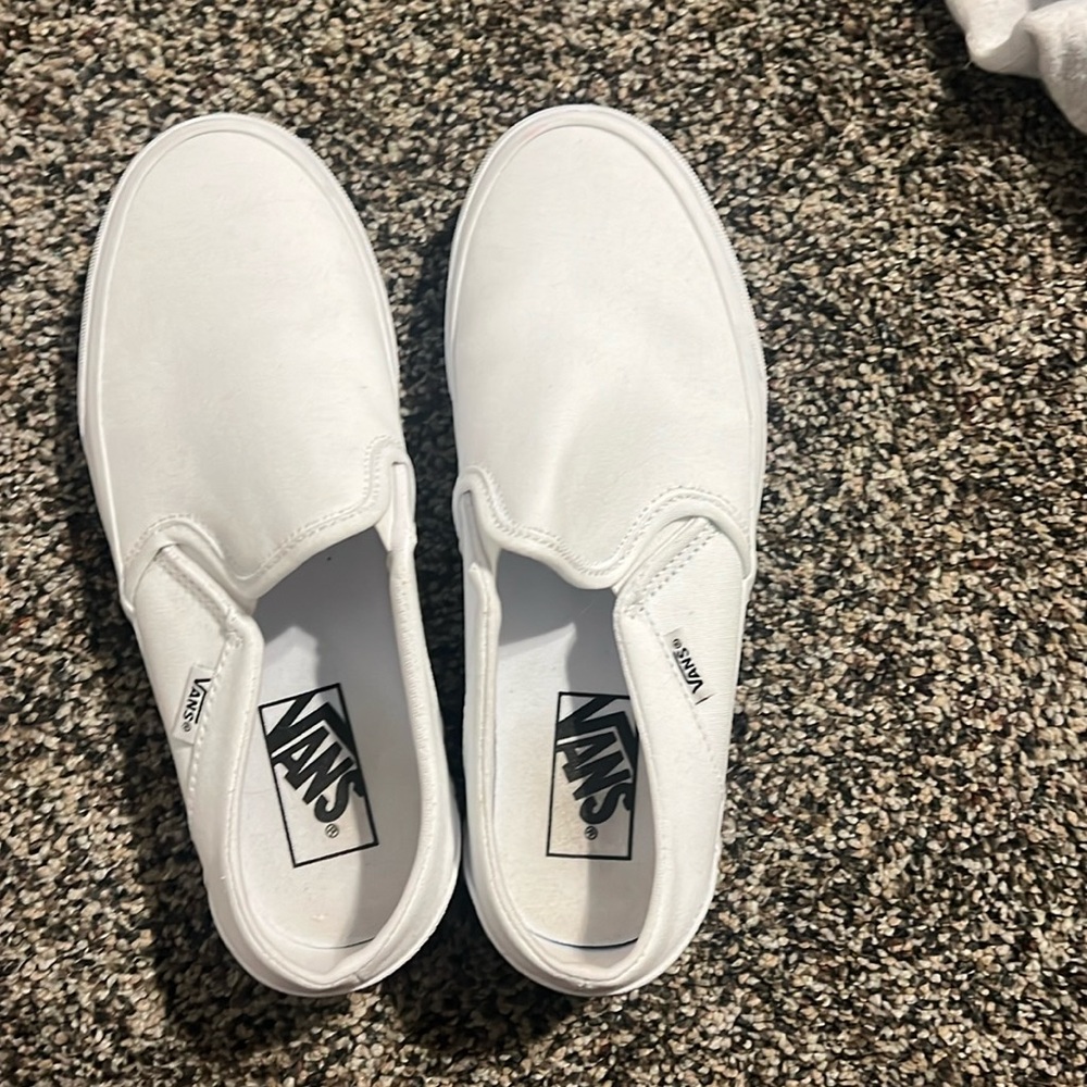 Women US size 7 all white vans. Super comfy!!!!